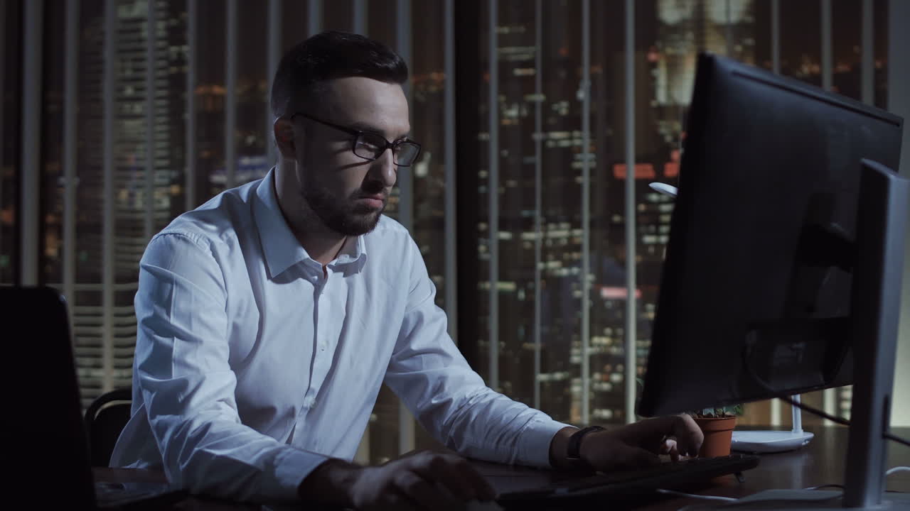 Businessman working late at night in an office