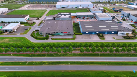 drone footage along the highways in the countryside. large storehouses away from the big cities.