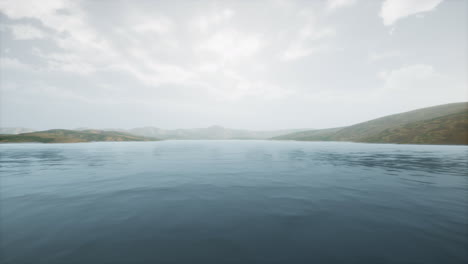 lake in hills on summer day