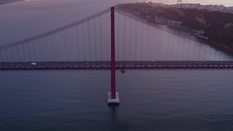 wide shot of one of the world's longest suspension bridges ponte 25 de abril, aerial