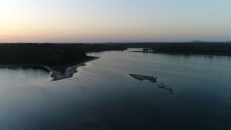 Flying-over-golden-hour-lake