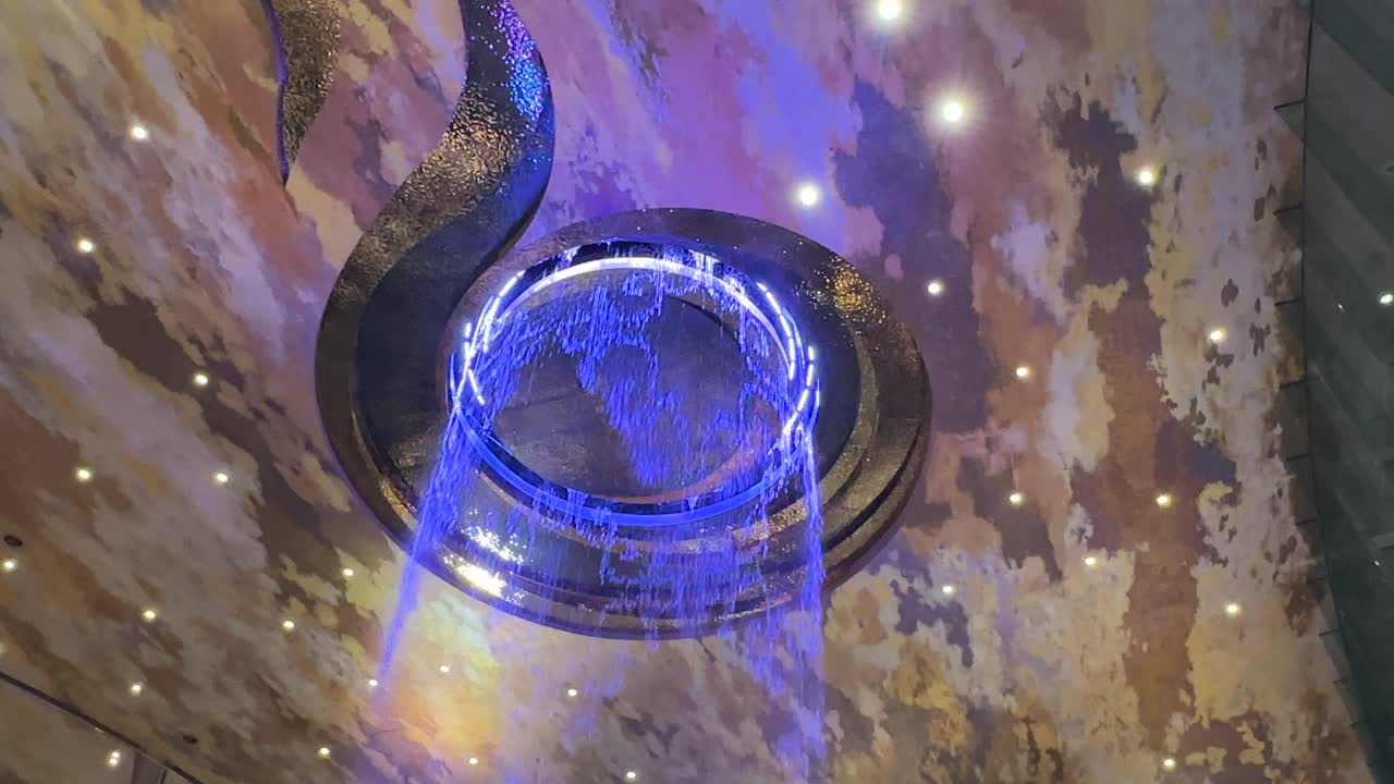 Alangkarn Waterfall Icon Siam Shopping Centre, Bangkok, Thailand - closeup blue water patterns