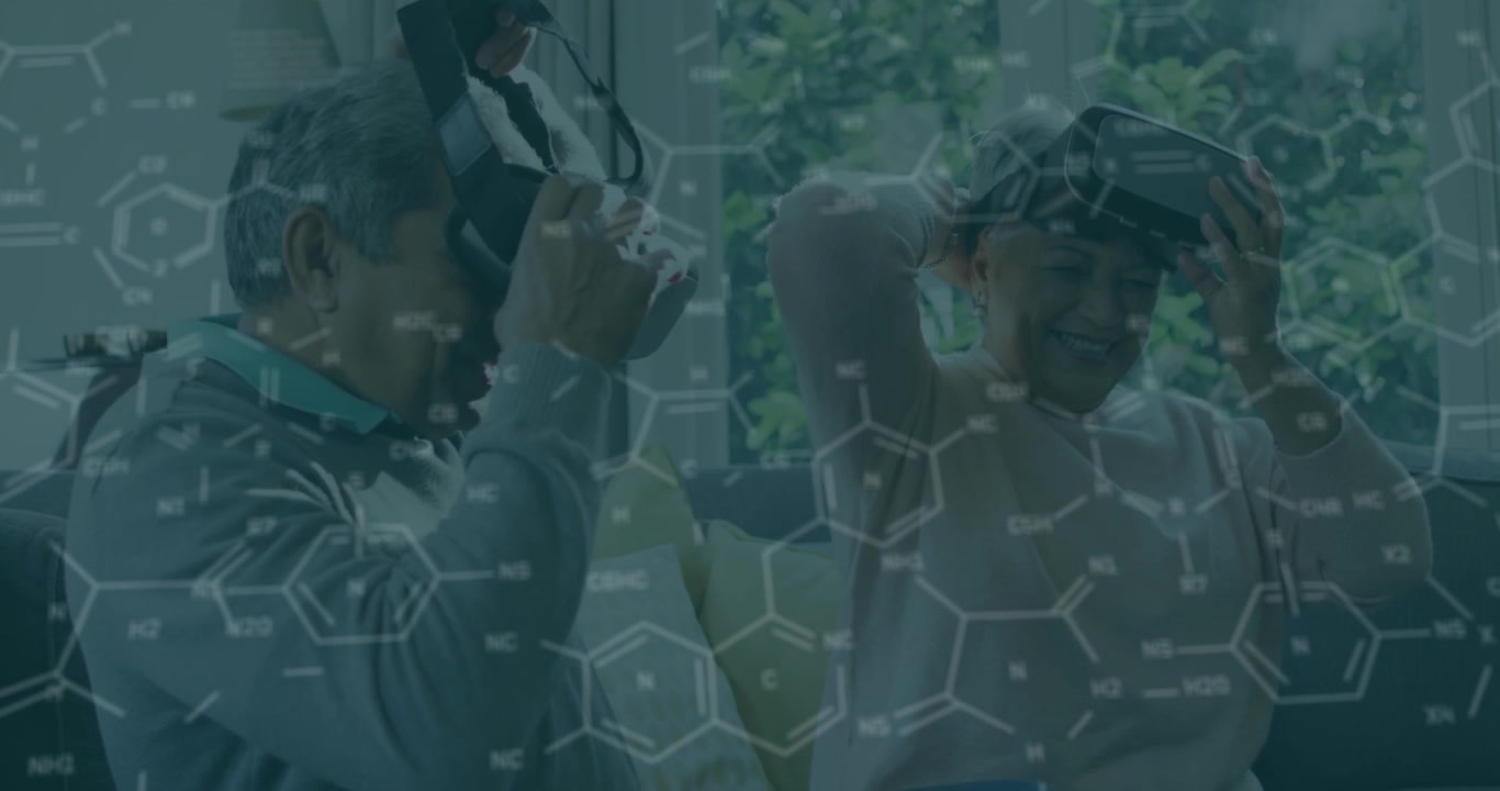 Animation of medical icons over senior couple using vr headset