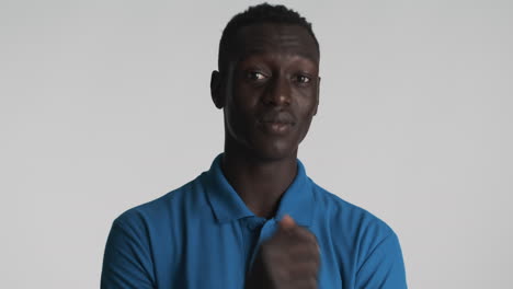 Thoughtful-African-american-man-on-grey-background.