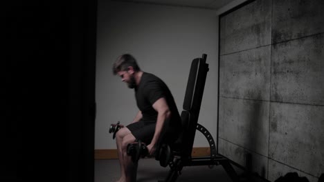 Dumbbell-seated-front-deltoid-raises,-cinematic-lighting,-white-man-dressed-in-black-gym-attire