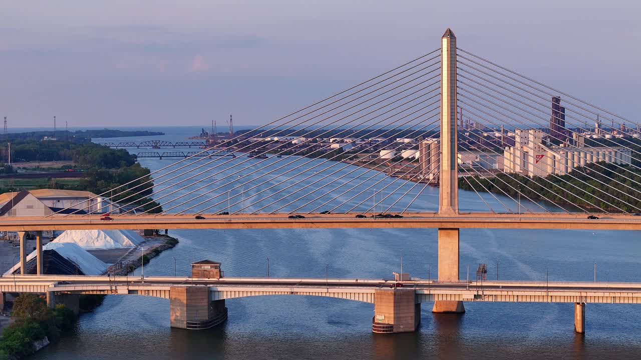 Craig Memorial Bridge over Maumee River in Toledo, Ohio at sunset in aerial view