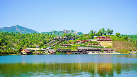 timelapse ban rak thai village near mountain and the lake