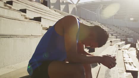 thoughtful athlete in the stadium