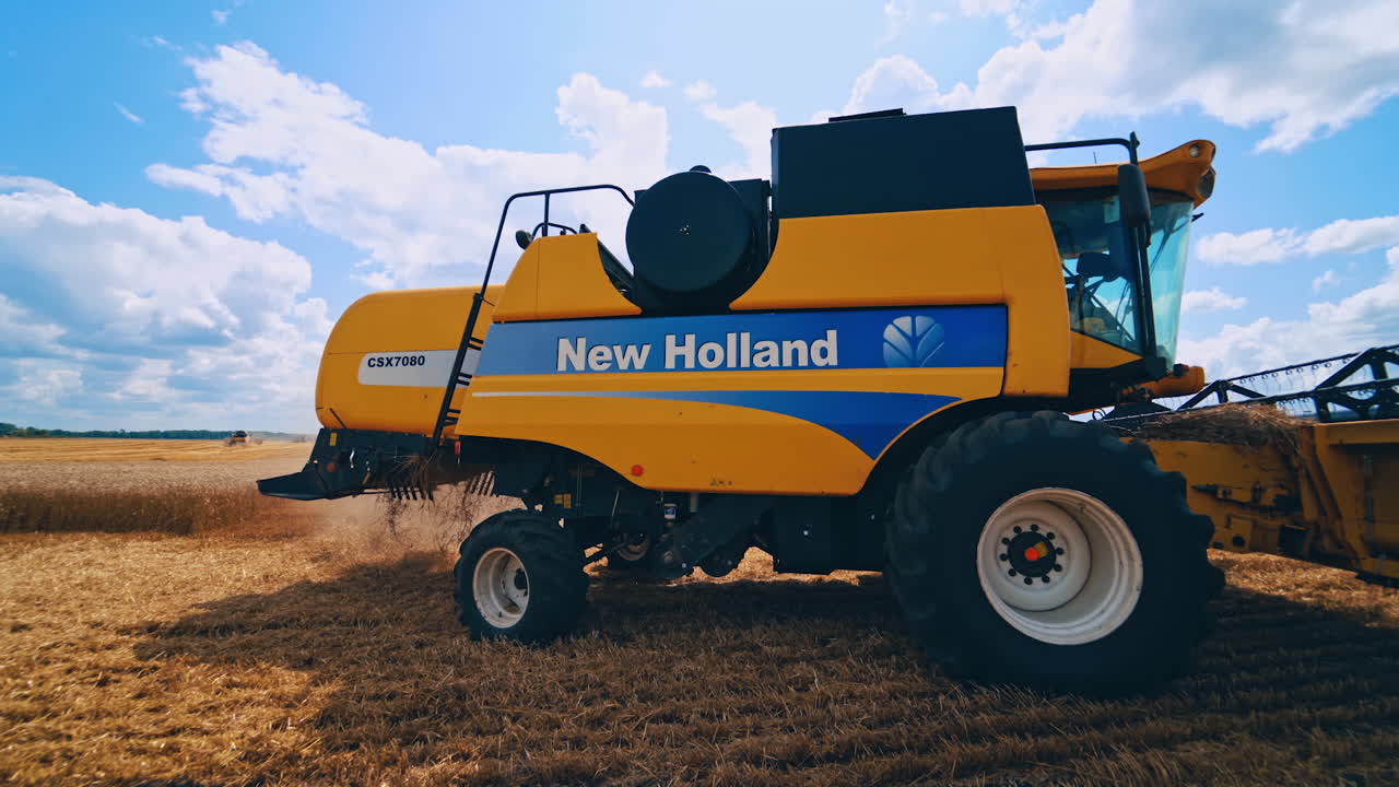 Harvest combine on field. New agricultural technology on wheat field