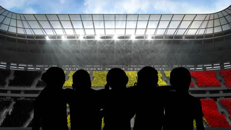 animation of silhouettes of team of sports women with belgian flag over sports stadium