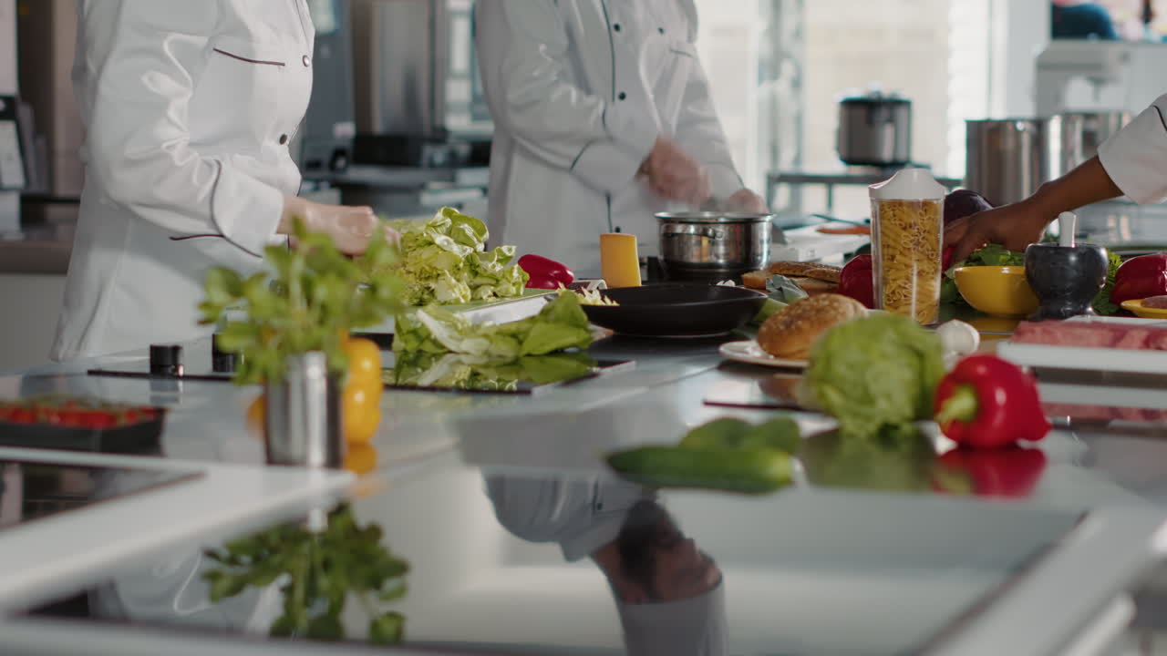 Authentic chef preparing green salad and celery leaves