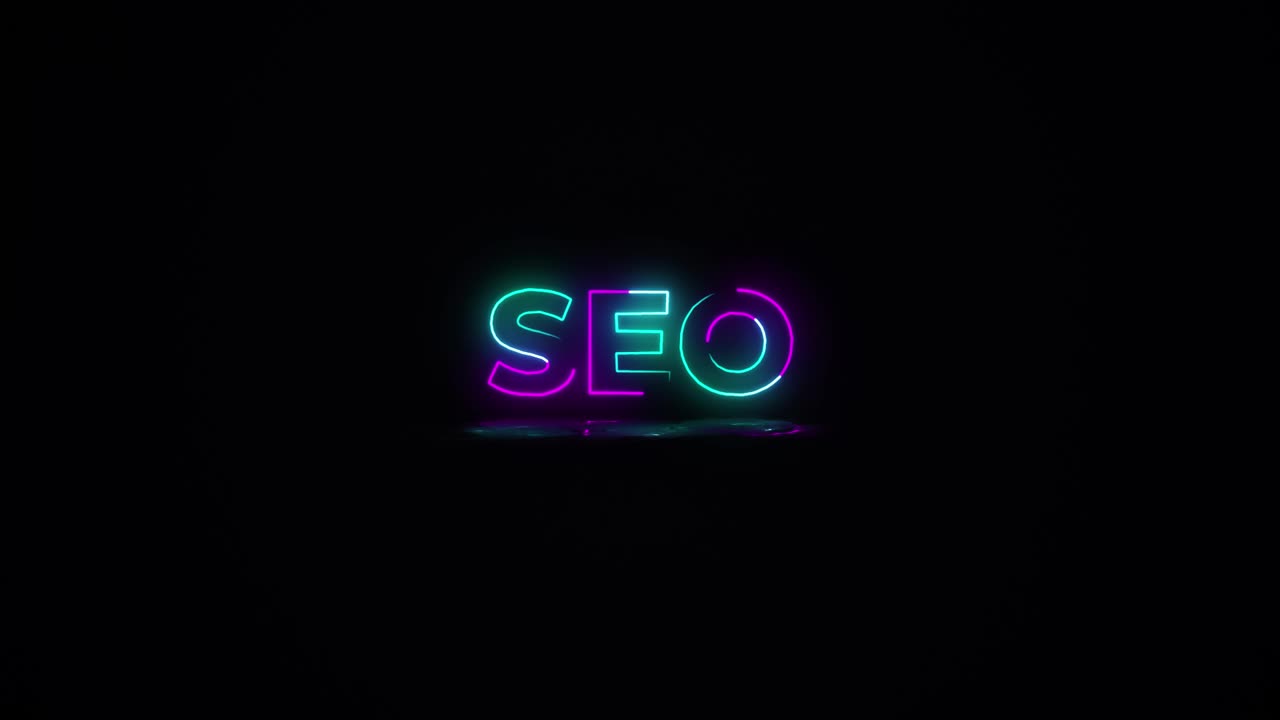 Flashing SEO electric green and pink neon Sign flashing on and off with flicker, reflection