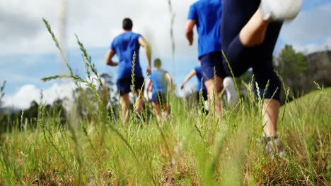 fit people jogging in boot camp 4k