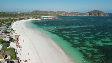 Aerial-of-Lombok's-Tanjung-Aan-Beach-is-a-tropical-gem-that-beckons-travelers-seeking-a-slice-of-paradise