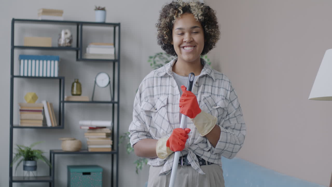 Woman Cleaning Living Room