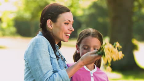 Smiling-woman-in-slow-motion-throwing-flowers