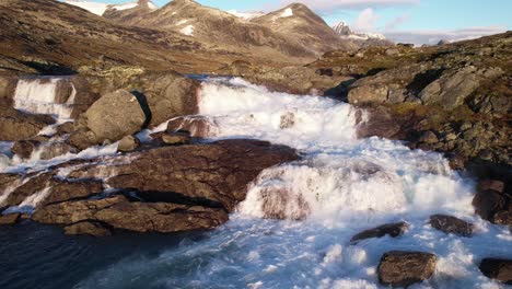 An-epic-waterfall-in-Norway-during-sunrise