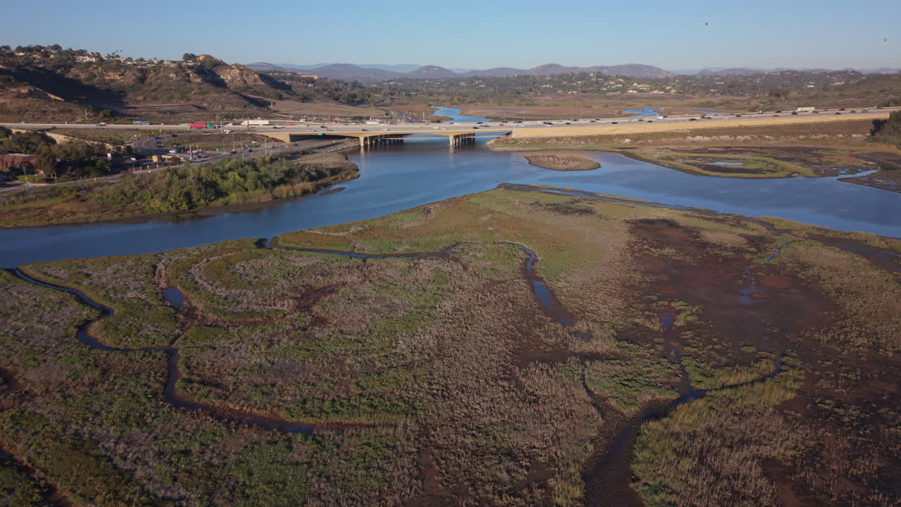 San Elijo lagoon in San Diego, California, aerial drone view. Heavy traffic on highway 5