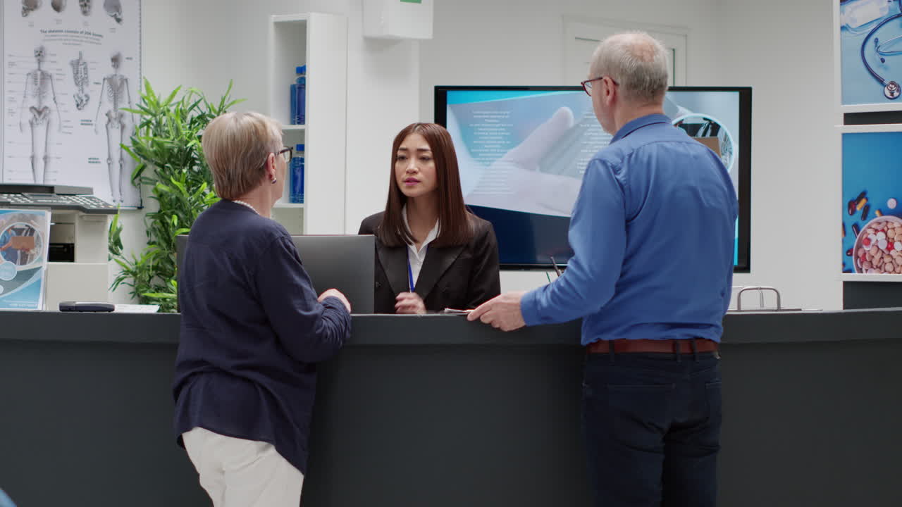 Hospital Reception Area with Patients and Staff