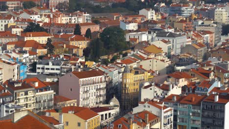 4k aerial shot of lisbon downtown architecture near beato at sunrise pan move