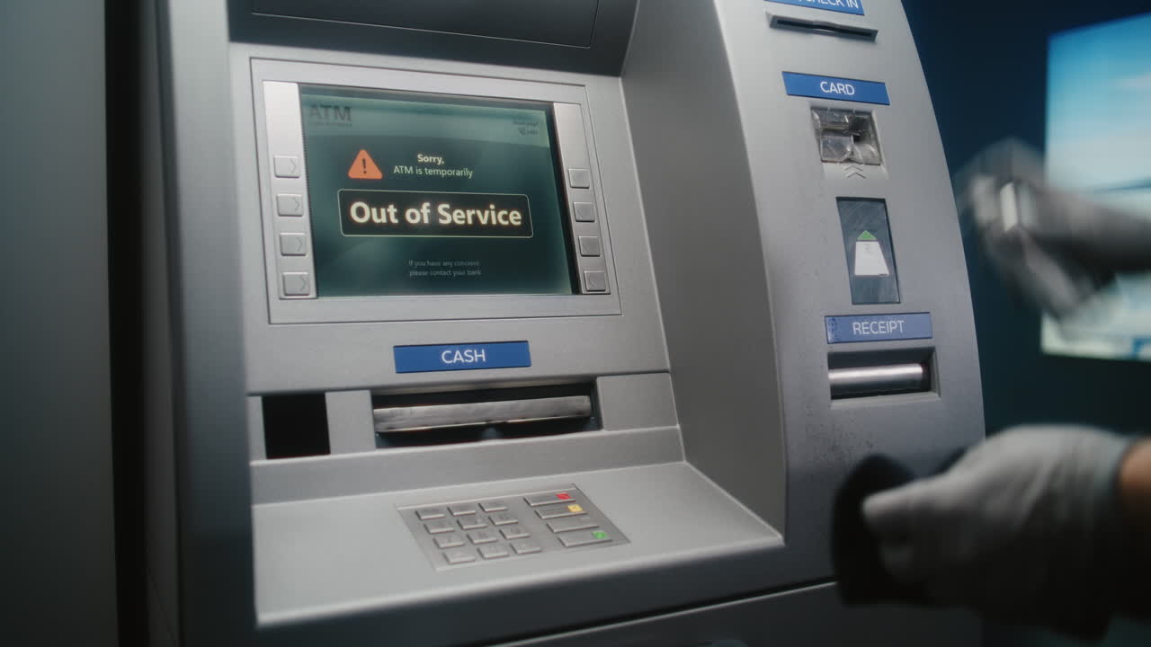 Cleaning Service: Professional Cleaner Wiping Out of Service ATM with Microfiber Rag, Cleaning Away Dirt and Dust, Preparing Automated Teller Machine, Cash Machine for Using. Public Banking Equipment.