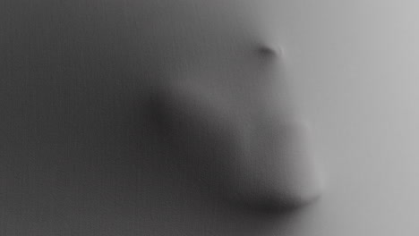 creepy silhouettes of a woman's hands appears from the white surface
