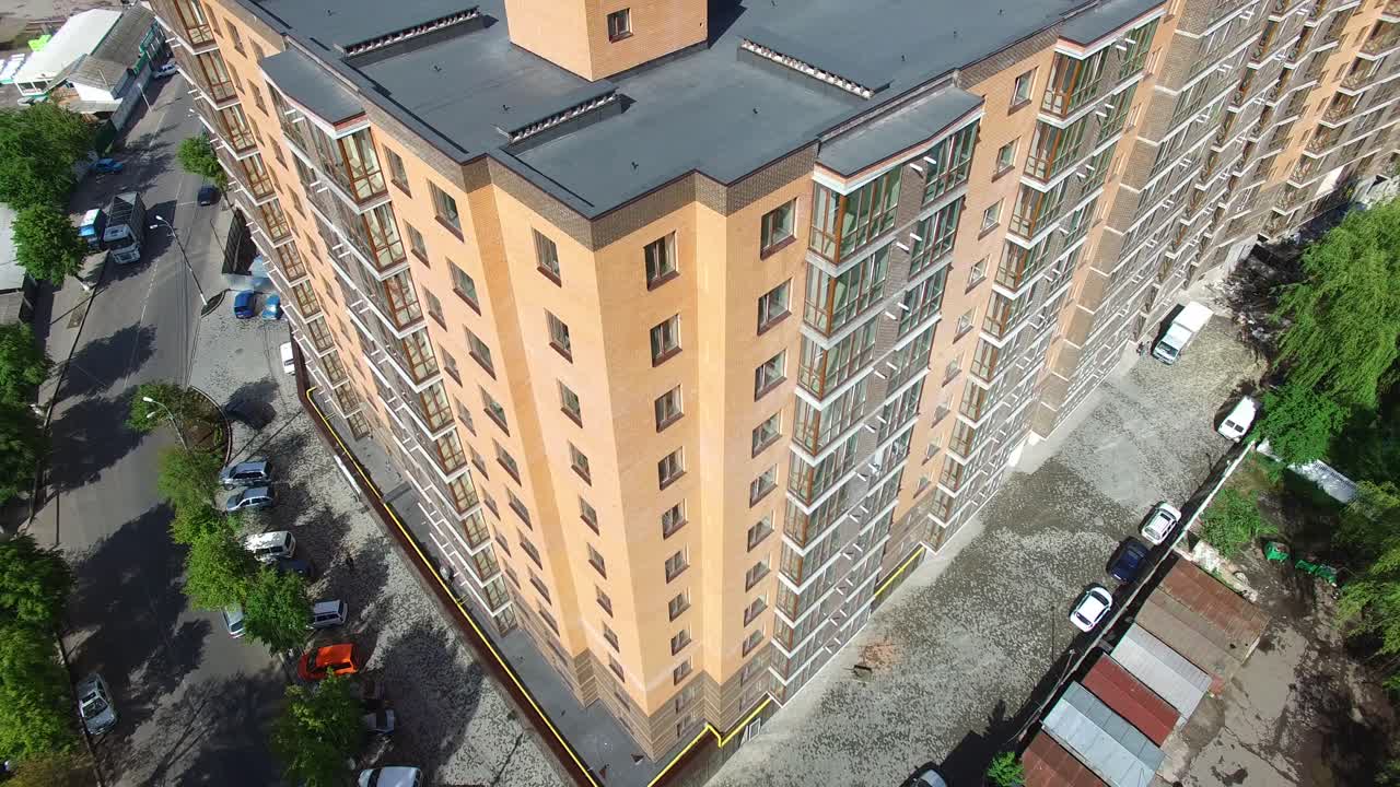 Facade Of A Multi-Storey Building. Aerial shot of the new apartments buildings exterior