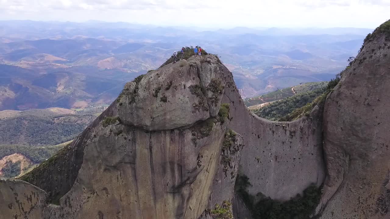 Extreme climbing at Pedra dos Cinco Pontões mountain, Espírito Santo, Brazil. Drone orbit shot.