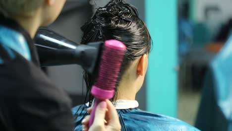 hairdresser dying female hair. woman client hair in beauty parlour hairdressing salon