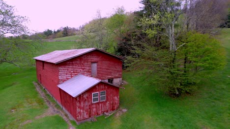 aerial-pullout-red-barn-near-boone-and-blowing-rock-nc,-north-carolina