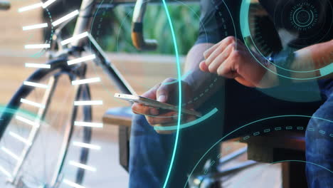 man using a mobile phone and 5g written in the middle of a futuristic circles