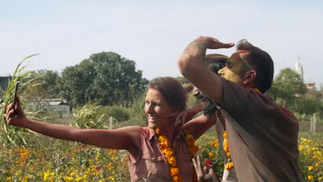 multi ethnic people celebrating the festival of colors holi in india