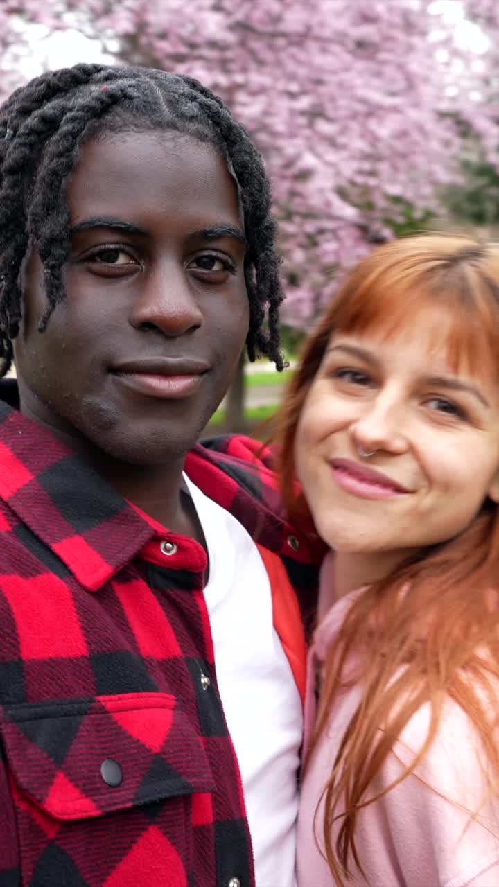 Couple enjoying cherry blossom season