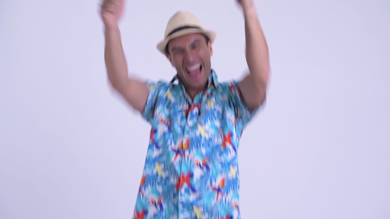 Young handsome Hispanic tourist man ready for vacation