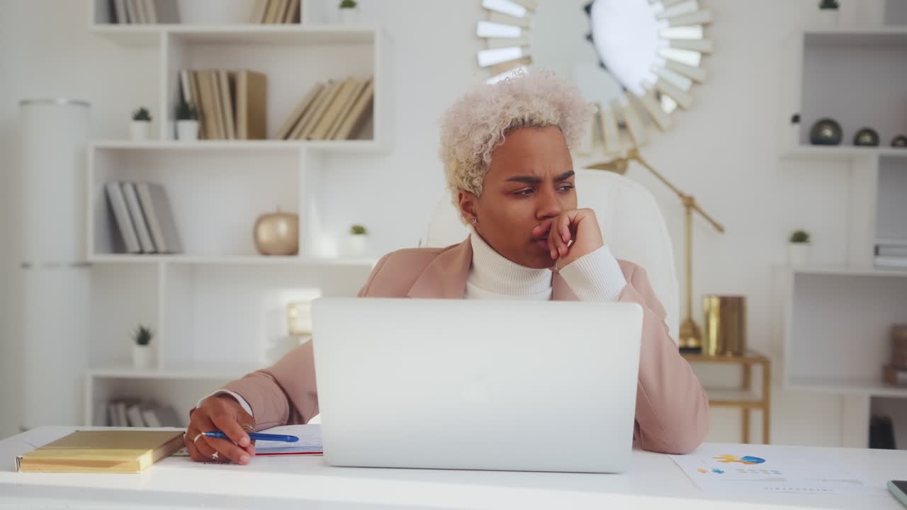 African american business lady pondering over ideas for new startup project