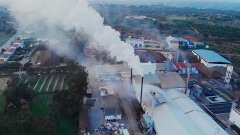 company emiting smoke aerial closeup