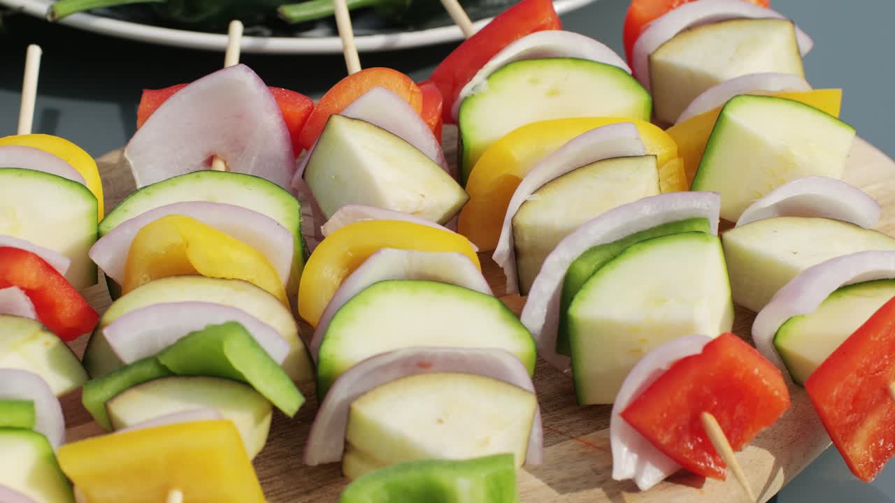 Vegan vegetarian bbq barbuque, grill Many various of green vegetables on plate close-up. Fresh artichoke, green pepper, zucchini, avocado. Cafe and restaurant food.