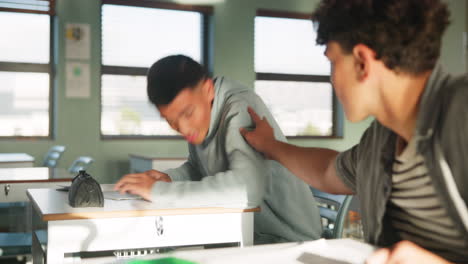 teenage friends studying together in a classroom