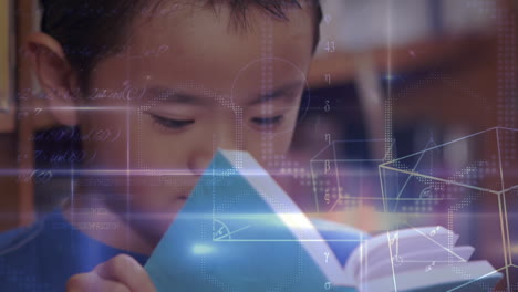 un lindo niño asiático leyendo un libro en cámara lenta