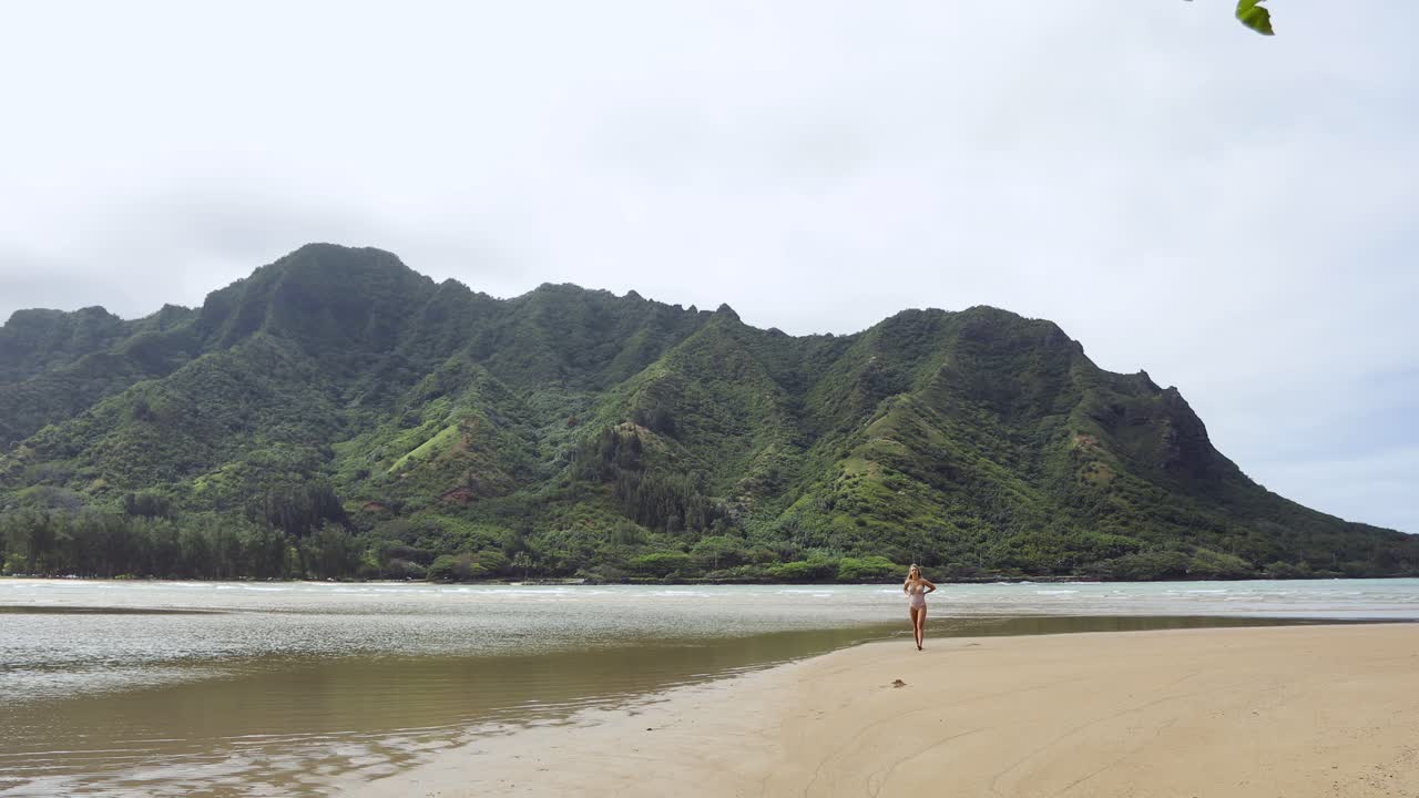 Breathtaking Site of a Woman - a Beautiful Landscape on Oahu, Hawaii