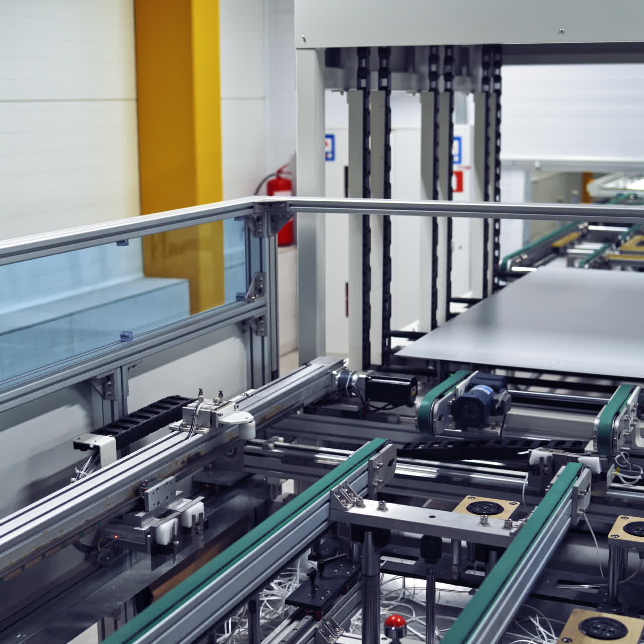 Interior of robotic plant. Modern automated equipment indoors. Process of making new details inside manufacturing plant.