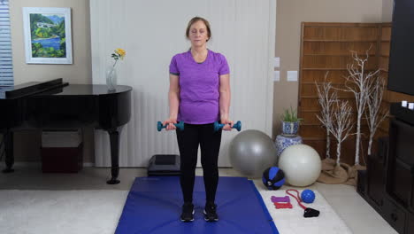 senior woman lifting weights to stay active and live healthy