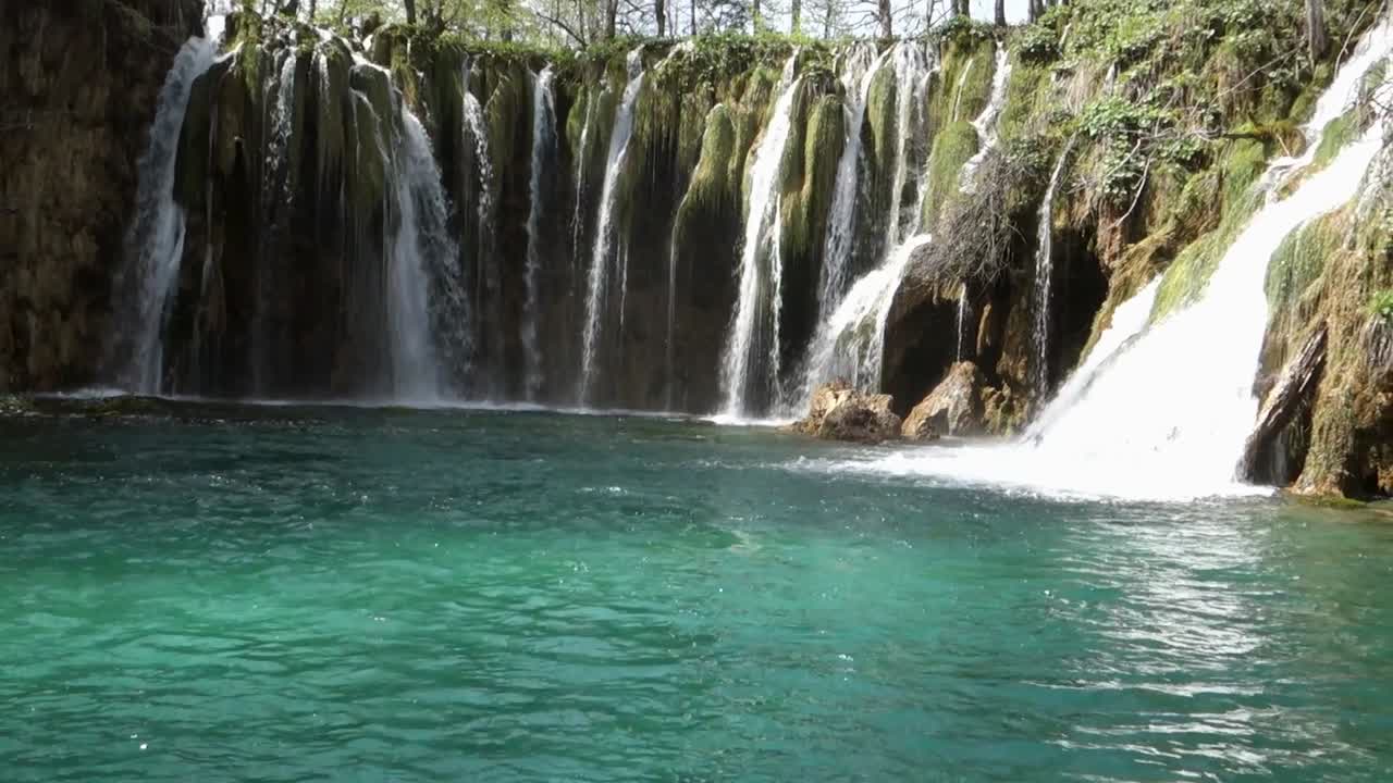 clear turquoise water at Plitvice Lakes National Park. spectacular waterfalls, lakes and flora in Croatia