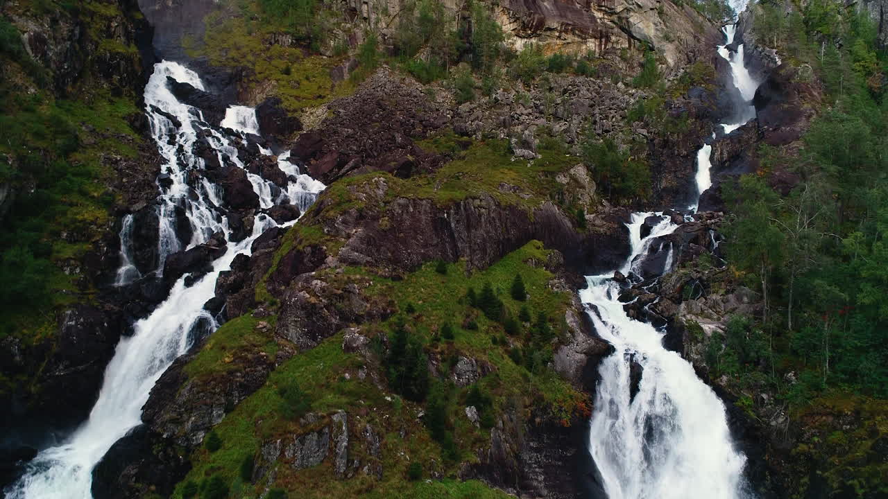 Aerial Rising Crane Shot of Twin Falls of Låtefossen at Dusk