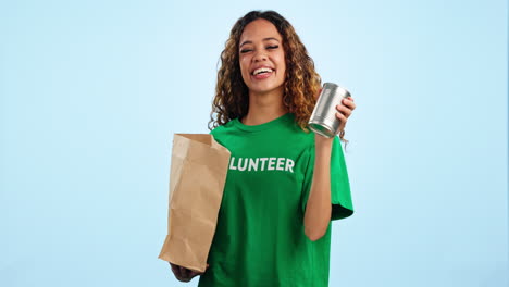 Volunteer-girl,-food-and-donation-in-studio