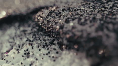 close up view of black and silver glitter