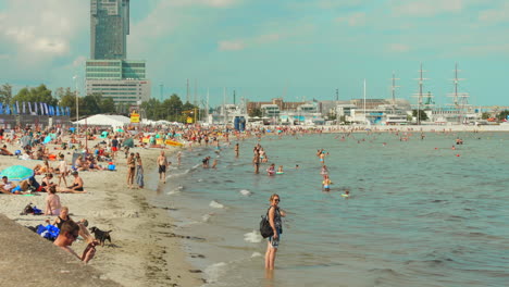 crowded beach on a sunny summer day