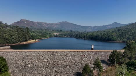 approaching drone view of mulunguzi dam in zomba city, malawi.