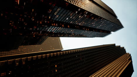 vertical format of looking directly up at the skyline of the financial district