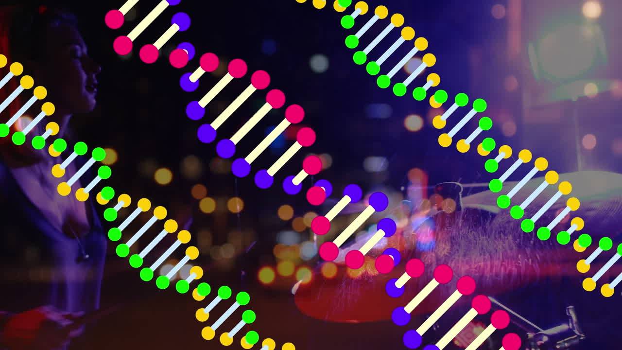 콘서트에서 타악기를 연주하는 남자의 dna를 회전시키는 애니메이션